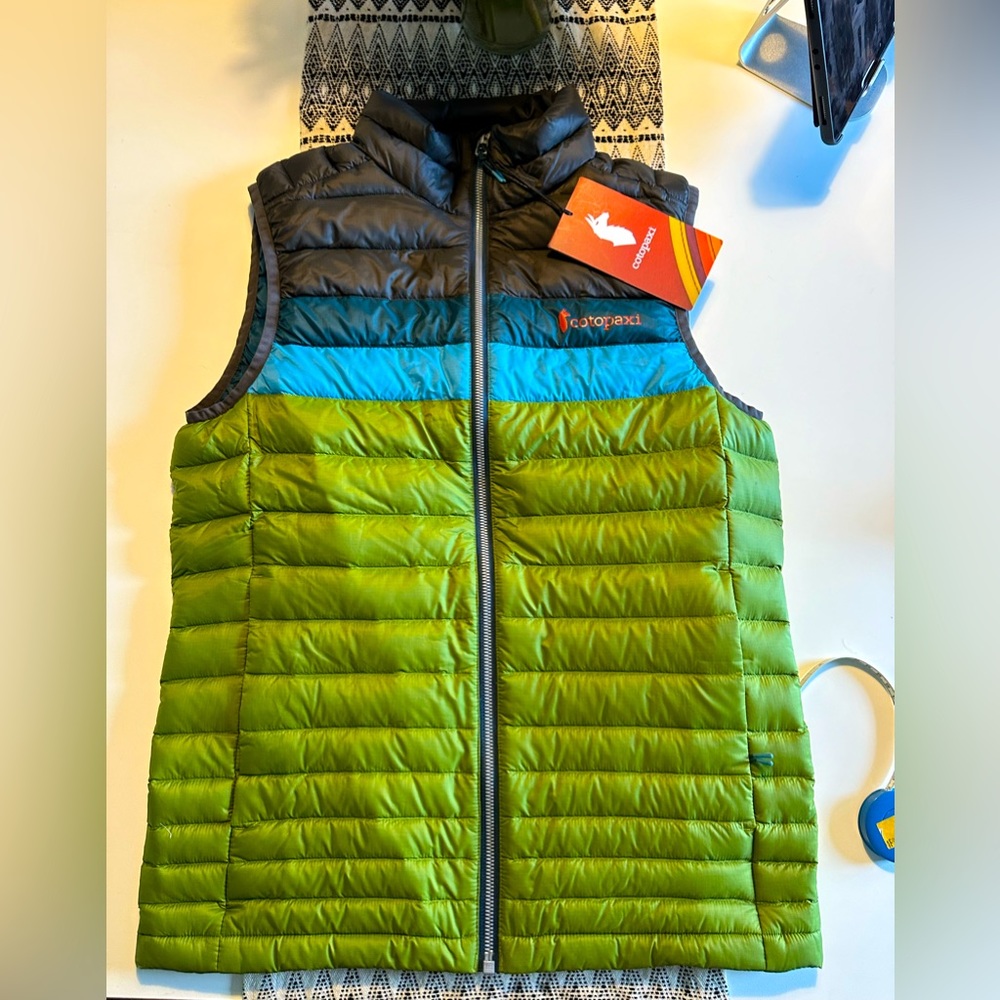 Cotopaxi fuego down vest size small. Iron and Cedar. New unworn with tags. $165
